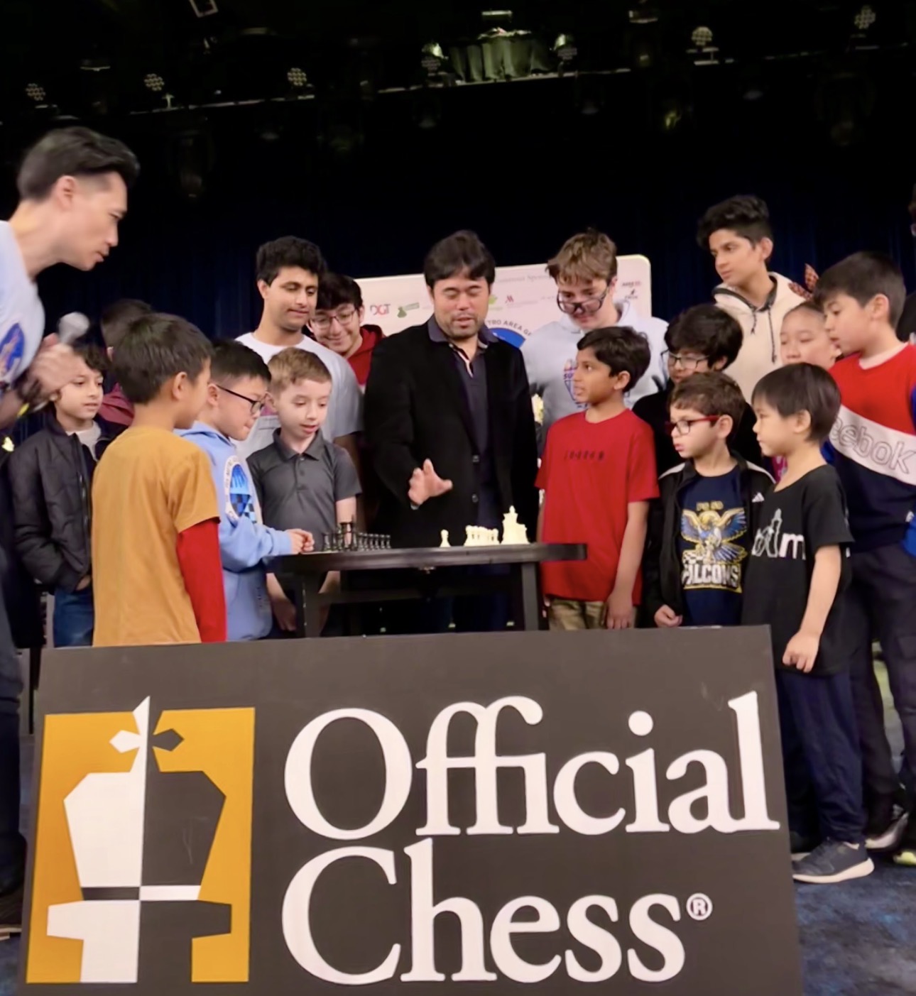 Kids gathered around a demonstration board